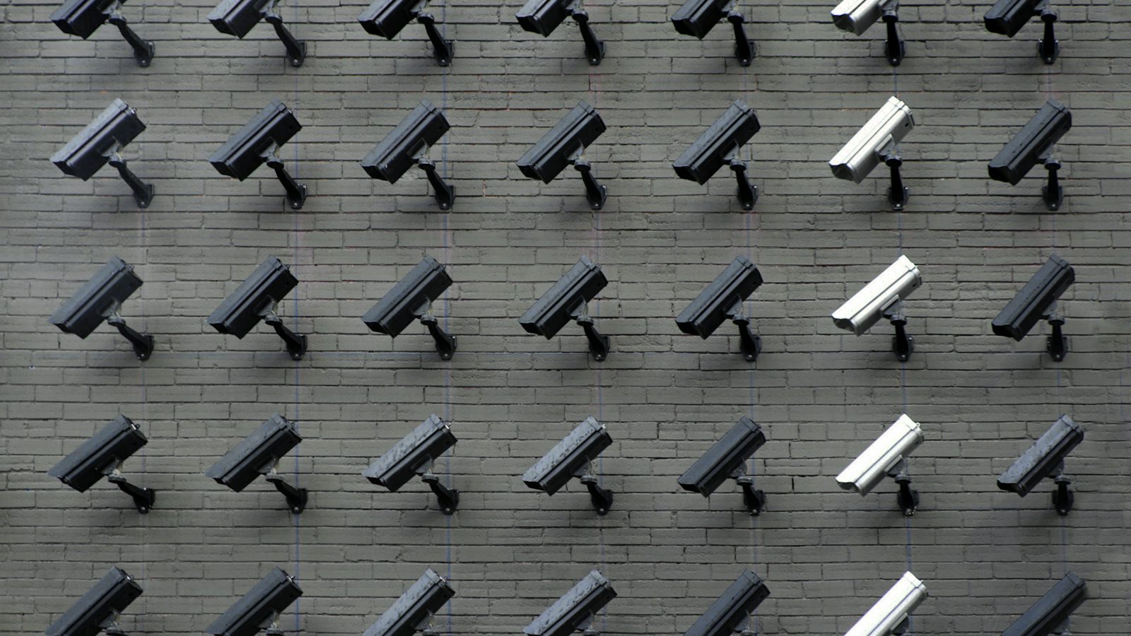 Wall of CCTV cameras representing business security camera installation in Monterey